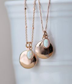 "A sweet new locket made with rose gold and an opal charm. Locket is rose gold plated and hangs from dainty rose gold plated chain. A small opal charm hangs off the side. See details and lengths below. * Locket - 13mm (1/2\") * Singapore chain -Adjusts to 18\" and 20\" only (has small ring to connect clasp at 18\" and 20\" lengths along chain) * Satellite Chain - Adjusts from 16-18\", or 18-20\" * Opal charm - Lab created opal, 6x4mm Please choose desired chain style and length at checkout. List Rose Gold Oval Charms Necklace, Rose Gold Oval Necklaces With Charms, Oval Rose Gold Necklaces With Charms, Rose Gold Oval Pendant Necklace With Charms, Rose Gold Locket Necklace With Charms For Gift, Dainty Rose Gold Locket Necklace For Anniversary, Rose Gold Charm Necklaces With Locket For Mother's Day, Rose Gold Locket Charm Necklaces For Mother's Day, Rose Gold Charms Necklace For Keepsake