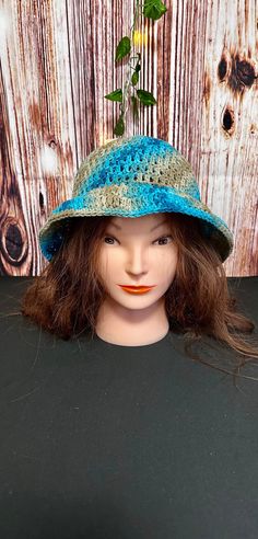 This beautiful bucket hat goes from blues to light blues also has some sand color. Reminds you of a day at the beach! Crocheted with 100% cotton yarn and is very lightweight. Stretchable fabric were one size fits most. Ocean Breeze, A Day At The Beach, Sand Color, Bucket Hats, Day At The Beach, Cotton Yarn, At The Beach, Caps Hats, Bucket Hat