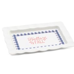 a white and blue tray with the words hellox's fall written on it