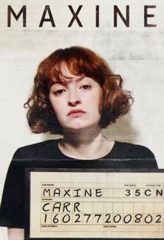 a woman holding up a fake ticket for the maxine show in front of her face