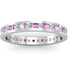 a white gold ring with pink and clear stones