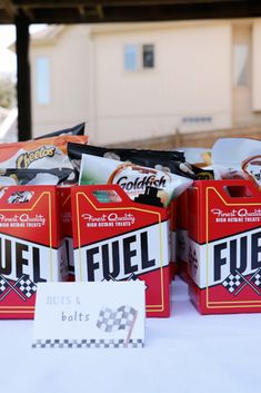 several boxes of fuel sit on a table