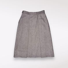 Vintage Stanley Blacker Wool Blend Skirt - High Waisted - A-Line * High-waisted design * A-line silhouette * Midi Length * Pleated in front  * Made in the USA * Side zip, button closure * Fully lined * Materials tag has been removed, may be 100% Wool, likely a wool blend  near perfect condition, ONLY flaw is button is loosely attached.  No other flaws!  SIZE 9 / 10  measurements   waist: (laid flat + across): 13.6"   length (from shoulder to hem): 27.6"   bottom hem (laid flat + across): 25.5" Design Awards, 9 And 10, Midi Length, Wool Blend, Midi Skirt, Art Collection, Womens Skirt, A Line, Bathing Beauties