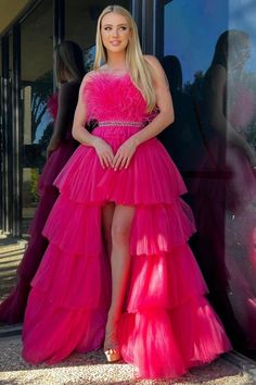 Let your inner beauty and style shine at prom with this stunning hot pink strapless dress! Adorned with feathered bodice and a beaded sash, the high-low tiered skirt will make you stand out from the crowd. Perfect for special occasions and making lasting memories.#prom#promdresses#promgown#formaldress#formaloutfit#seniorpromdress#promgown#blacktieeventdresses 90 Dresses, Prom Dress With Feathers, Hot Pink Prom, Hot Pink Prom Dress, Dress With Feathers, Feather Prom Dress, 90s Prom, Pink Evening Dress, Pink Prom Dress