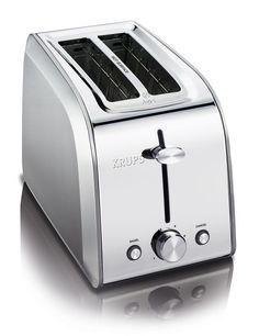 a close up of a toaster on a white surface