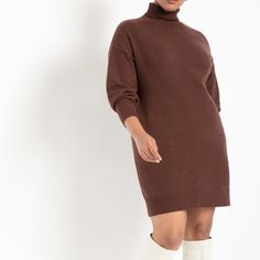 Color: Dark Brown. Turtleneck Sweater Dress. Oversized. Dropped Shoulder. Bottom And Sleeve Rib. Poly/Nylon. Hits Above Knee. Length Is About 37 1/2". 88% Polyester / 12% Nylon Oversized Chic Knee-length Mini Dress, Elegant Oversized Mini Dress, Oversized Knee-length Mini Dress For Fall, Oversized Dresses For Fall Daywear, Oversized Brown Dress For Winter, Knee-length Mini Dress For Daywear In Fall, Oversized Knee-length Winter Dresses, Brown High Neck Winter Dress, Oversized Midi-length Sweater Dress For Spring