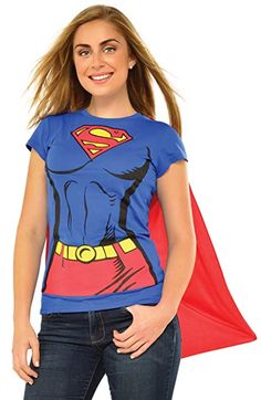 a woman wearing a superman t - shirt with a red cape