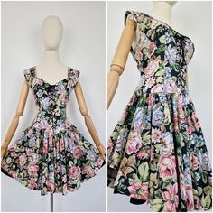 "Vintage corset bustier lace up floral mini cotton dress. Features full circle skirt with black lining on the sides which is longer than outer skirt. Arm straps has beautiful pleats. Fastens with lace to the front and zip at the back. Bust and waist can be cinched with the ribbon. Made from soft medium weight cotton fabric. Black with pink, green, sage, greyish blue and light brown floral print. Fabric: 100% cotton Brand: Mix Up Very good vintage condition / has few tiny repairs around some eyel Spring Vintage Corset Dress With Sweetheart Neckline, Vintage Corset Dress With Sweetheart Neckline For Spring, Vintage Corset Dress With Fitted Bodice For Spring, Vintage Sweetheart Neckline Corset Dress For Summer, Spring Cotton Corset Dress With Corset Back, Vintage Summer Dresses With Corset Back, Vintage Dresses With Corset Back For Summer, Spring Vintage Overbust Corset Dress, Fitted Cotton Floral Dress With Ruffles