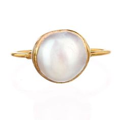 "A delicate white pearl ring. As shown in the first photo, these make excellent stacking rings.  ✨ Gem size 9-12mm White Fresh Water Pearl Pure 14k gold fill Shank 24k Gold Dipped ✨ Please read our FAQ for more information on our unique materials and process.  You will receive one of the pieces pictured above, or a piece nearly identical to the rings above. Since each gemstone is one-of-a-kind, I cannot guarantee that the gemstone you see above will still be available. I have tried my best to ph Pearl Ring Gold, White Pearl Ring, Gold Pearl Ring, Mother Of Bride, Bride Gift, June Birthstone, Real Pearls, Copper Rings, Unique Materials