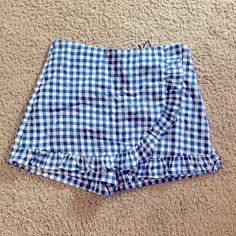 Beautiful Ruffled Side Scoop Design With A Nice Blue And White Gingham Print. Size Medium. Very J Brand. Never Worn. Would Be Cute To Be Dorothy From Wizard Of Oz. Preppy Bottoms For Summer Day Out, Preppy Summer Bottoms For Day Out, Preppy Gingham Bottoms For Summer, Preppy Summer Bottoms For Picnic, Gingham Cotton Bottoms With Ruffles, Cotton Gingham Bottoms With Ruffles, Preppy Plaid Bottoms For Summer, Preppy Summer Plaid Bottoms, Casual Ruffled Bottoms For Picnic