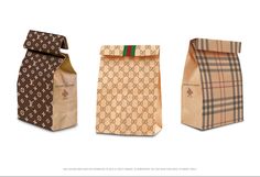 three bags with different designs on them and one has a brown bag in the middle