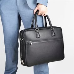 Introducing the Executive Elite Men's Bag, a fusion of durability and elegance with its cow leather and alligator texture. It's perfect for the man who appreciates style in every aspect of life. Black Textured Leather Shoulder Bag For Business Trips, Modern Textured Leather Shoulder Bag Briefcase, Soft Leather Briefcase For Business Trips, Modern Textured Leather Shoulder Briefcase, Modern Black Bags For Business Meetings, Business Satchel In Soft Leather, Modern Black Business Bags, Luxury Bags For Business Meetings, Formal Soft Leather Laptop Bag