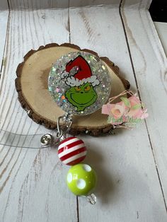 Grinch badge reel on your choice of swivel or belt clip. Toy story The reel is on a retractable badge reel in either alligator clip or belt clip that you choose at checkout.  These are handmade and I take the photos myself. Some glitters are harder to capture the effects they have.  If you do not want beads please add that to the notes. Also some beads may need exchanged out do to availability. That is very rare but could happen.  Thank you for looking at my shop, if you have any questions please ask. I also would like to add, before leaving a less than 5 star review reach out to me first so I can try to fix any issues you may have. Badge Reel Ideas Nurse, Diy Badge Reel How To Make Epoxy, Adjustable Fun Badge Holders For Gifts, Adjustable Badge Reel With Key Clip As Gift, Adjustable Badge Reel With Key Clip Gift, Novelty Adjustable Badge Holders For Gifts, Novelty Adjustable Badge Holders For Gift, Novelty Personalized Adjustable Badge Holders, Teacher Badge Reel