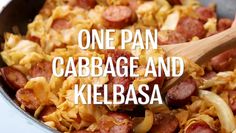 one pan cabbage and kielbasa is shown with the words, one pan cabbage and kielbasa