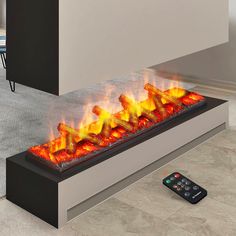 an electric fireplace with flames and remote controls