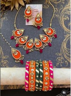 Beautiful handmade fabric jewelry sets. Beautiful crafted on wooden frames and decorated with vibrant fabrics and charms . Color can be customize , even designs can be customized as per customer`s requirements. Single piece or bulk order can be place for party, functions, give away, gifts, return gifts or any occasion. Please give us a chance to serve . Thanks  Town Of Trinkets Return Gifts, Handmade Fabric, Fabric Jewelry, Wedding Jewelry Sets, Bulk Order, Single Piece, Wooden Frames, Jewelry Set, Labour Day