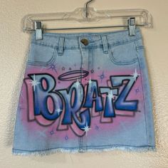 Nwt Size Small Fits 25-26” Waist 12.5” Length Denim Lots Of Stretch! Front & Back Pockets Will Have The Cameras Ready To Flash! This Denim Mini Skirt Has Airbrushed Graphics On The Front & Frayed Hems Pink Mini Denim Skirt, Pink Mini Denim Skirt Casual, Pink Casual Mini Denim Skirt, Blue High Waist Skirt For Streetwear, Pink Fitted Trendy Denim Skirt, Casual Pink Mini Denim Skirt, High Waist Blue Skirt For Streetwear, Trendy Fitted Pink Denim Skirt, Y2k Pink Denim Bottoms