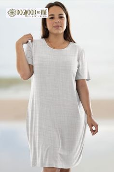 Introducing our Flora Perfect Tee Dress in Linen Canvas! Made from lightweight and breathable fabric, this dress is perfect for any casual occasion. The relaxed fit and classic design make it a versatile addition to your wardrobe. Whether you're strolling on the beach or running errands, this dress has got you covered. Comfortable Relaxed Fit Dress With Short Sleeves, Casual Stretch T-shirt Dress For Summer, Relaxed Fit Solid Summer Dress, Solid Color Relaxed Fit Summer Dress, Solid Color Summer Dress With Relaxed Fit, Casual Relaxed Fit Dresses For Beach Season, Breezy Relaxed Fit Dress For Loungewear, Casual Solid Beach Dress For Spring, Solid Color Casual Beach Dress For Spring