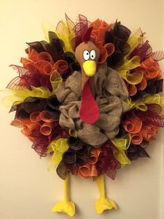 a turkey wreath hanging on the wall