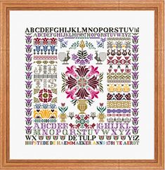 a cross stitch pattern with the letters and numbers on it, in a wooden frame