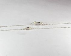 Mother and Daughters big sister and little sister forever we love.This dainty and simple set of two bracelet are just designed for you. Celebrate the Joy of family. This beautiful Mother Daughter Matching jewelry set is a perfect gift for a mother and daughters, sisters or best friends. It would also make a wonderful gift for girls.bridesmaid gifts, for mother child ,new mother jewelry,expectant mother with twin gifts * Sterling Silver chain and clasp * Adorable Bead charms feature extremely hig Sterling Silver Double Strand Bracelet Gift, Double Strand Sterling Silver Bracelet For Gift, Heart Pearl Bracelet, Twins Gift, 2 Best Friends, Sisters Forever, Lil Sis, Mother Jewelry, Friends Set