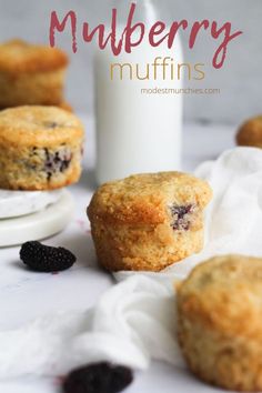 muffins with blueberries and blackberries on the side