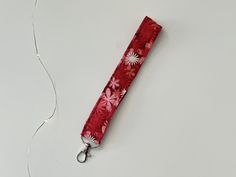 🔑 floral keychain wristlet is perfect when you are on the go. Keychain Wristlet is a perfect small gift for anyone (friends, coworkers, teachers, and etc.). ️DETAILS: - 6 inches by 1 inch -cotton fabric, batting, claw clasp -lighting may vary due to lighting  📦SHIPPING DETAILS: -key for wristlet will be shipped out the following day you order it -pinecone lanyard will be package safely and will receive some stickers -spend $35 and get free shipping -NO RETURNS OR EXCHANGES 🏷️ Get 20% off your first order when you sign up: https://mailchi.mp/d91a8b7d92af/caitlynmcr 🔑IF YOU LIKE THIS KEY FOB YOU MAY LIKE: https://mycreativereading.etsy.com?section_id=47236397 📱Social media for behind the senses and to keep up to date: INSTAGRAM: https://www.instagram.com/mycreativereading?igsh=MWd0aGR4Y Floral Keychain, Keychain Wristlet, Wrist Lanyard, Wristlet Keychain, Id Badge Holders, Badge Holder, Id Badge, Small Gift, Badge Holders Lanyard