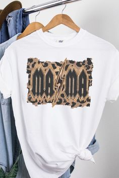 Mama Leopard Oversized Graphic Tee is printed on the popular Comfort Colors 1717 Relaxed Oversized T Shirt. Lightweight and super soft, this shirt is a comfortable fit for effortless style. For a more oversized fit, Honey Tee recommends sizing up one size. For more accurate measurements, visit the Comfort Colors website. Disclaimer: The models typically are portrayed wearing a size Small but are wearing a size Medium in this image Leopard Graphic Tee, Colors Website, Leopard Print Graphic Tee With Lettering, Trendy Leopard Print T-shirt With Crew Neck, Cotton Graphic Tee With Tiger Print, Trendy Leopard Print Graphic T-shirt, Colorful Website, Oversized Graphic Tee, Tee Outfit