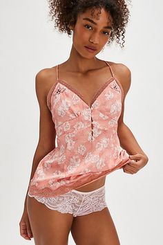 You’re so special in this silky cami from Intimately, featured in a floral with button and lace detailing for all the femme vibes. **Fit:** Relaxed, full length **Features:** Silky fabrication, V-neckline, triangle cups, empire waistline, flattering darting, lace trim, racerback, floral print, embroidered details **Why We | Night Special Cami by Intimately at Free People in Orange, Size: S Fitted Floral Print V-neck Sleepwear, Elegant Floral Print V-neck Sleepwear, Floral Print V-neck Camisole, V-neck Floral Print Nightgown, Empire Waistline, Multicolor Floral Print V-neck Sleepwear, Embroidered Details, Vest Fashion, Cami Tanks