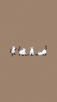 four cats are walking in a line on a brown background