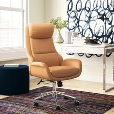 an office chair sitting on top of a rug