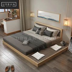 a large bed sitting on top of a wooden floor