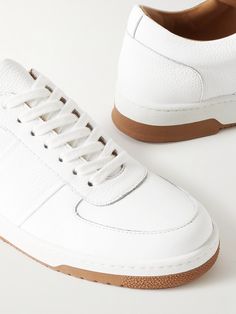 DESIGNED BY MR PORTER. As The Journal says, "Every man’s footwear rotation should contain a pair of white sneakers for one simple reason: they can be worn with absolutely anything". Mr P.'s 'Atticus' version is made from full-grain leather with tonal laces and lightweight rubber soles. Lower Impact Materials. This product is made using at least 50% lower-impact materials or ingredients. Find out more about our Consciously Crafted criteria here. White Sports Sneakers With Stitched Sole, High-top Sneakers With Stitched Sole For Everyday, Classic White Custom Sneakers With Abzorb Midsole, Everyday High-top Sneakers With Stitched Sole, Low-top Golf Shoes With Rubber Sole And White Sole, Low-top Golf Shoes With White Rubber Sole, Modern Low-top Golf Shoes With Rubber Sole, Golf Shoes With White Contrast Sole And Round Toe, White Custom Sneakers With Round Toe For Everyday