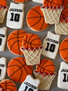 decorated cookies with basketballs and jerseys on them