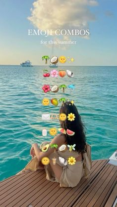 a woman sitting on top of a wooden dock next to the ocean with emo combs