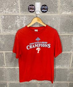 B Blaze vintage Offers this Vintage Y2K 2000s Philadelphia Phillies World Series Champions Red MLB Graphic T-Shirt Delta tag, size M Measurements upon request. All flaws will be pictured, see photos for condition.  Please reach out for any questions! Follow us on Instagram!  @BBlazeVintage Refund Policy No refunds will be granted due to dissatisfaction of how the items looks or fits. If there was a flaw in the item you feel that was missed, please reach out to us ASAP to find a solution. If you want measurements on any items and or more photos, just let us know! Phillies World Series, Phillies Shirt, Philadelphia Phillies, World Series, Y2k 2000s, Fancy Dresses, Vintage Y2k, Philadelphia, Mlb