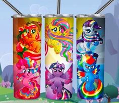 three different colored cans with cartoon characters on them and one has a rainbow pony in the middle