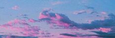 the sky is pink and blue with clouds