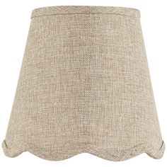 a beige lamp shade on a white background