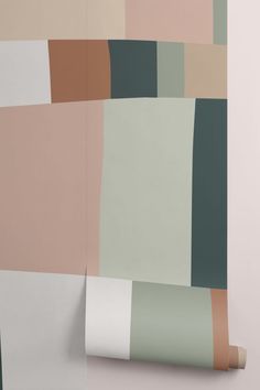 an abstract wallpaper with pastel colors and white paper rolled up on the side