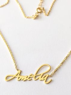 14K Gold Name Necklace, Custom Name Necklace, Personalized Gold Name Necklace, 14K Dainty Name Necklace, Personalized Gold Name Necklace I can personalize Name Necklace with your preferred name/word of your choice. You will love this fashion yet stylish dainty name necklace with a personalized feel.FEATURESMaterial: 14K Solid GoldColor: White Gold, Gold, Rose GoldDimensions: Pendant height: 7 MillimetersAll our jewelry is custom made Love and Care in our workshopProduction: Handmade and Laser Cu Handwriting Necklace, Name Necklace Gold, Gold Letter Necklace, Necklace Name, Solid Gold Necklace, Gold Name Necklace, Nameplate Necklace, Custom Name Necklace, Letter Necklace