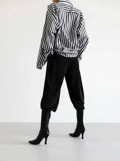 A luxe cotton-blend oversized dress shirt with longer length and button down. Black and white stripes create a sophisticated look. Slight stretch from spandex material. Model is wearing MINUSEY S. ✔️ Free worldwide express shipping over $100✔️ Loved by 6,500+ customers✔️ Limited edition collections, maximum style⠀⠀⠀⠀⠀⠀⠀⠀⠀Stay ahead of the trend with can’t-find-anywhere-else staples. Your closet will thank you 💕 * MINUSEY S = EU 34, US 2* MINUSEY M = EU 36, US 4* 70% Cotton / 27% Nylon / 3% Spandex* Dry clean* Made in Korea - Model Height: 170cm/5'7" (US2, EU34) Oversized Vertical Stripes Blouse For Work, Oversized Dress Shirt, Oversized Shirt Dress, Oversized Dress, Black And White Stripes, Long Length, Model Height, Dress Shirt, White Stripe