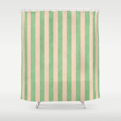 a green and beige striped shower curtain