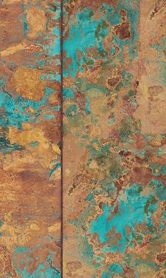 an old rusty surface with green and brown paint on the top, bottom and bottom