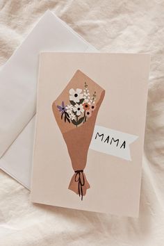 a greeting card with an image of a bouquet of flowers and the words mama on it