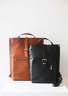 Elevate your daily commute with our meticulously handmade leather laptop backpack for men or women. Versatile and durable convertible leather work bag that seamlessly transforms into a crossbody leather laptop bag with top handles, secure top zipper and practical zipper pockets. * Simple and Elegant design; * Unisex Design - designed for men or women; * Super Practical top handle; * High Quality, Soft Natural Full Grain Leather; * Top Zipper Closure; * Front zipper pocket; * Back zipper pocket; Leather Backpack Laptop Bag, Everyday Leather Laptop Backpack, Leather Laptop Bag Standard Backpack For Daily Use, Leather Laptop Bag For Daily Use, Modern Leather Backpack For Everyday Carry, Modern Brown Leather Backpack For Everyday Carry, Modern Brown Leather Backpack For Everyday, Modern Brown Leather Backpack, Leather Backpack With Zipper For Everyday Use