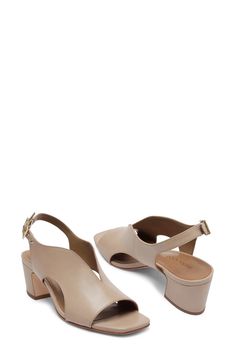 Curvy cutouts and a deep vamp distinguish this leather slingback pump set on a cushioned footbed and lofty block heel. 2" heel Cushioned footbed Leather upper, lining and sole Made in Brazil Slingback Pump, Women's Pumps, Block Heels, Leather Upper, Nordstrom, Pumps, Heels, Leather