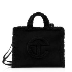 Telfar X Ugg Medium Black Suede And Shearling Shopper Tote. Nwt Purchased Off Of Ugg Website. Measurements: (Height 10 3/4", Width 15", Depth 5", Drop 21") Ugg Telfar, Telfar Black, Telfar Logo, Telfar Bags, Ugg Bag, Telfar Bag, Wool Tote, Western Outfits Men, Dec 1