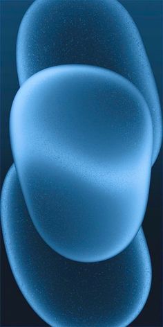 an abstract image of blue bubbles on a black background