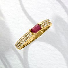 Ross-Simons - .30ct Ruby, .26ct t. w. Diamond Ring in 14kt Yellow Gold. Size 9. Our beautiful ring will add a bright spark to your day. A .30 carat emerald-cut ruby sits on a band of 14kt yellow gold illuminated by rows of .26 ct. t. w. diamonds. 1/8" wide. Diamond and ruby ring. Ruby birthstones are the perfect gift for July birthdays. Yellow Gold Diamond Birthstone Ring With Half Eternity, Fine Jewelry Diamond Ruby Half Eternity Ring, Dazzling Yellow Gold Ruby Ring With Brilliant Cut, Dazzling Yellow Gold Ruby Ring With Diamonds, Diamond And Ruby Ring, Natural Ruby Ring, Ruby Birthstone, Ring Ruby, July Birthday